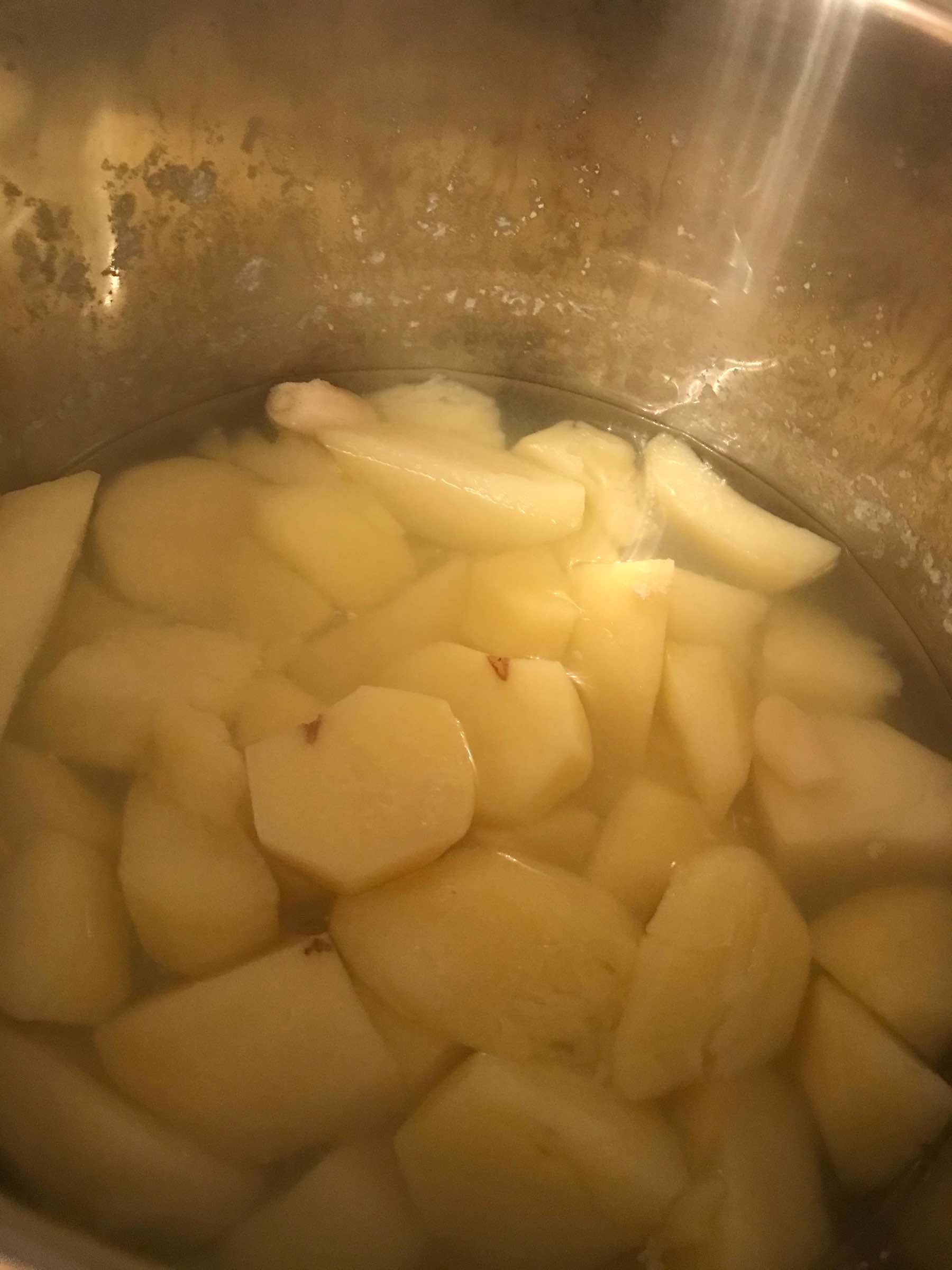 Quartered potatoes before cooking